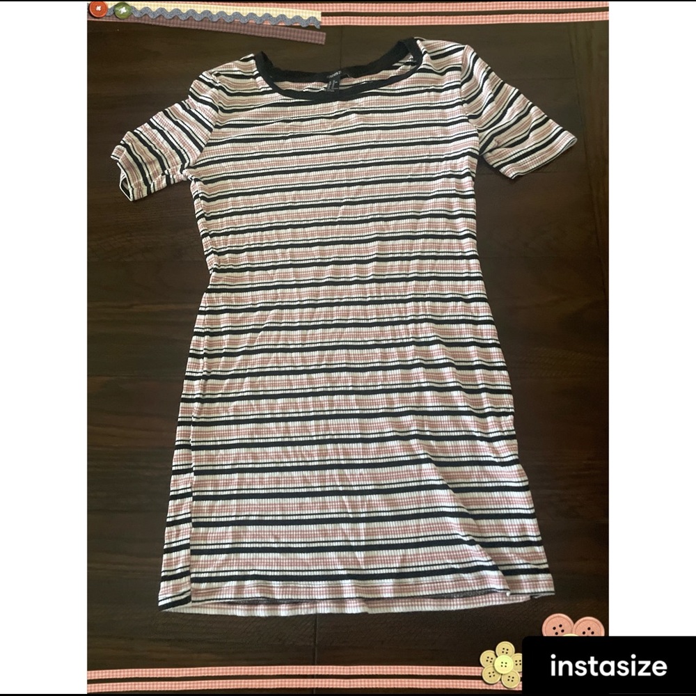Cute dress. Fits right above the knee. Material is very soft.